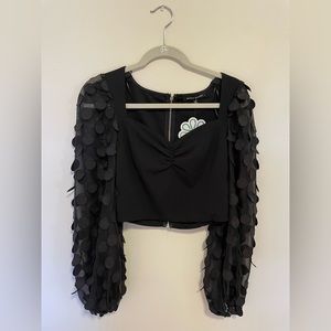 Black long sleeve polka dot top